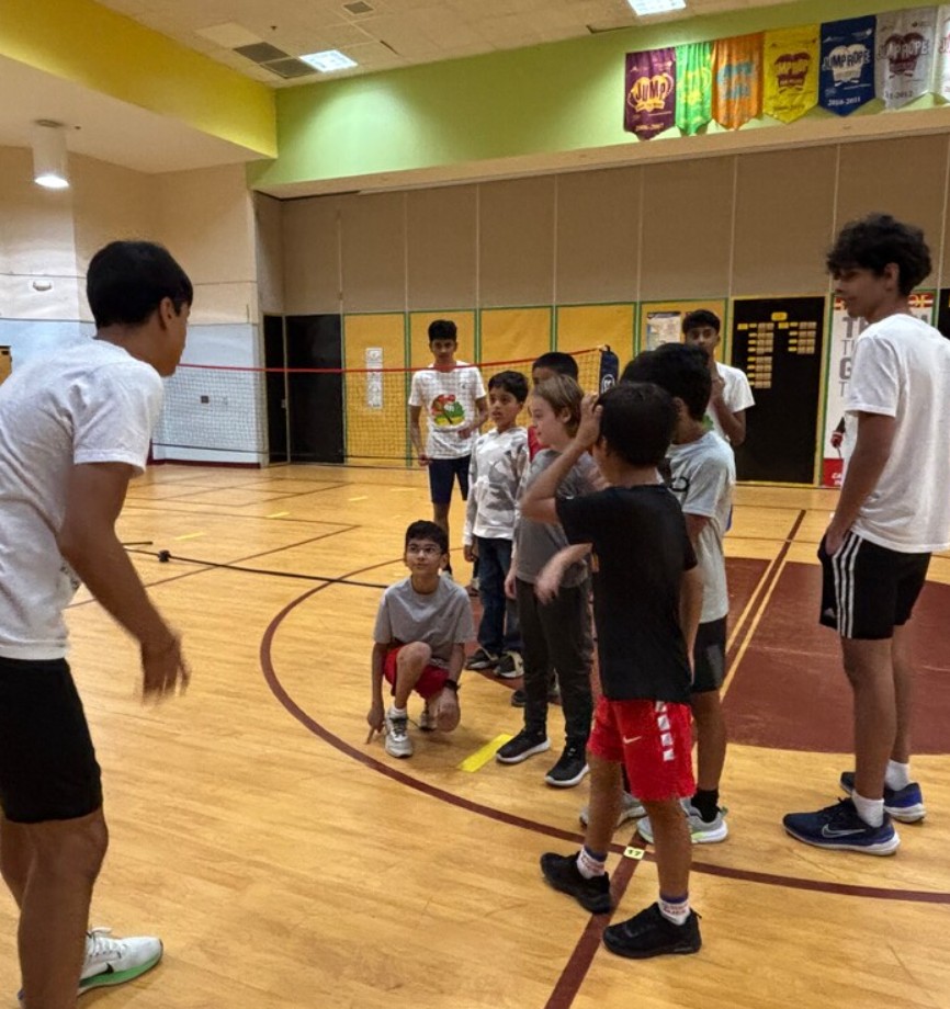 Coach instructing players at Carpenter Elementary
